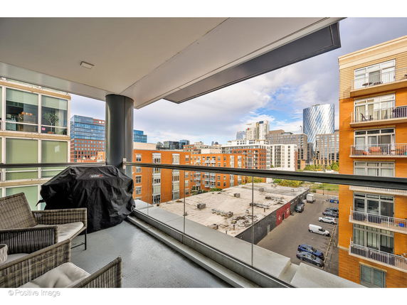 View of surrounding buildings from a balcony.