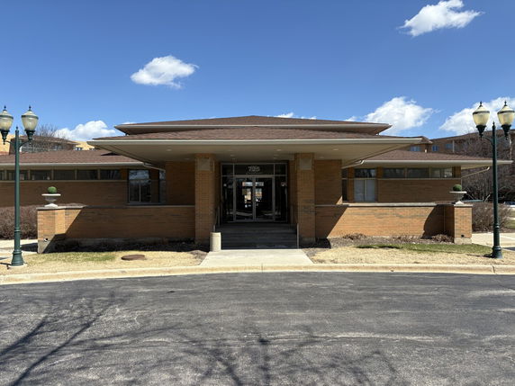 Front view of a single-story brick building.