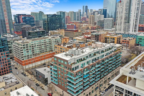 Panoramic view of a cityscape with modern buildings and skyscrapers.