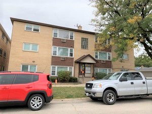Front view of a three-story residential building.