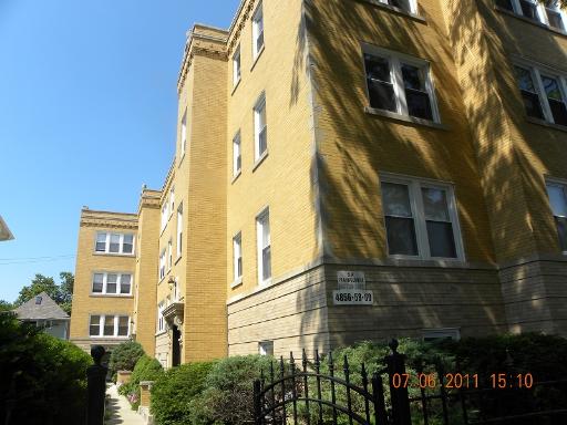 Front view of a multi-story apartment building.