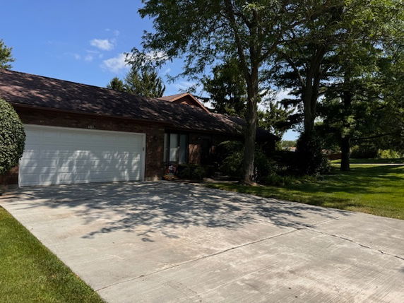 Front view of a single-story house with a double garage.