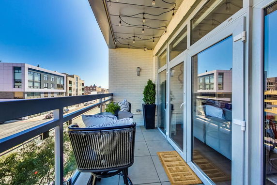 Balcony view with buildings in the background