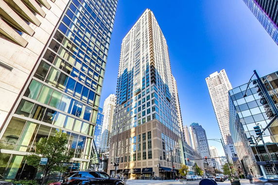 Front view of a high-rise building in an urban setting.