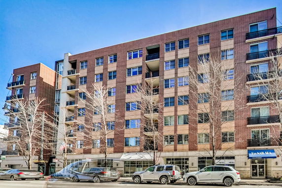 Front view of a multi-story apartment building.