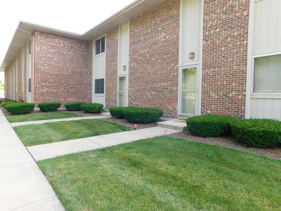 Front view of a two-story brick building.