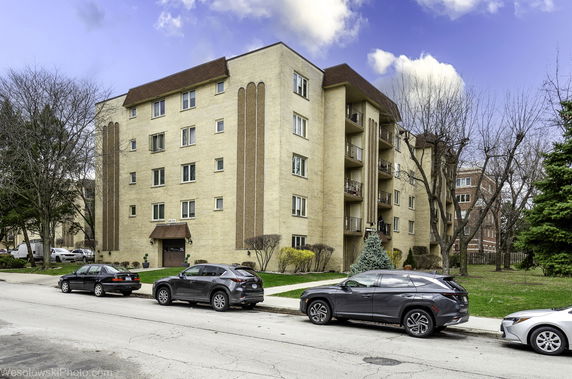 Front view of a multi-story residential building.