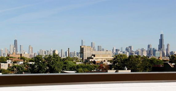 Panoramic view of a city skyline with skyscrapers in the background.