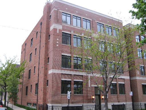 Front view of a multi-story brick building