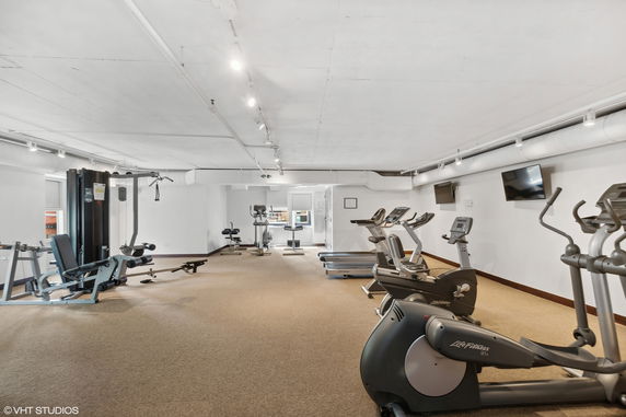 Interior view of a gym with exercise equipment.