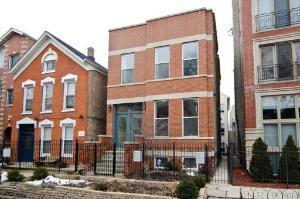 Front view of a two-story brick house.
