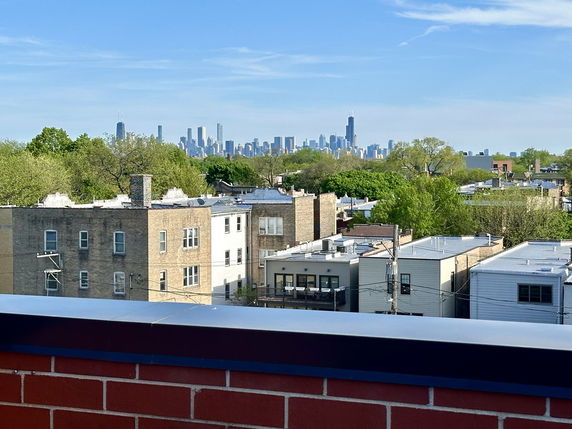City skyline seen from a rooftop.
