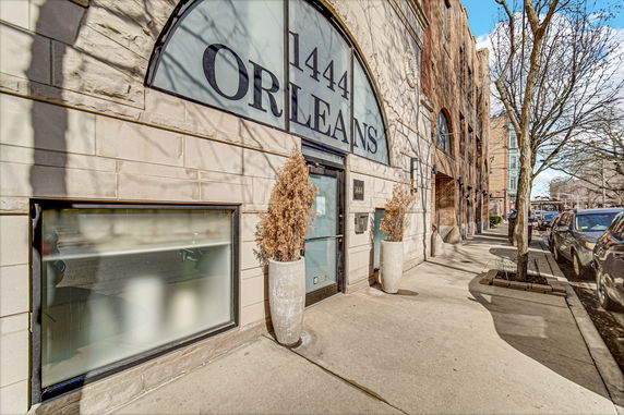 Front view of a building with the address 1444 Orleans.
