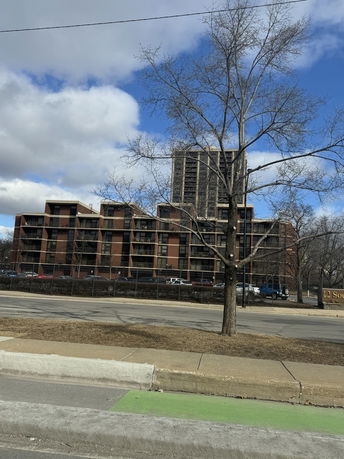 Front view of a multi-story residential building.