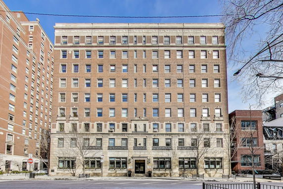 Front view of a multi-story apartment building.