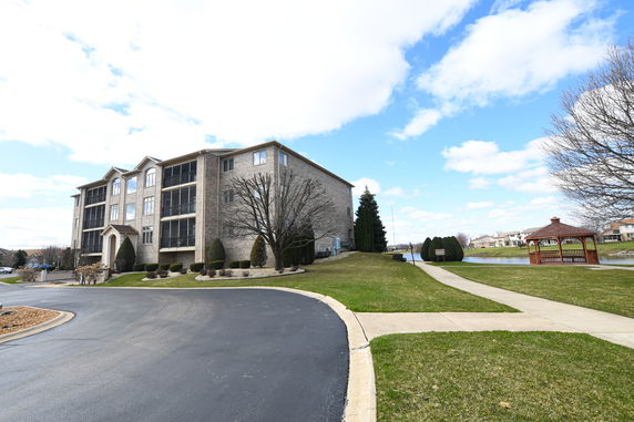 Front view of a multi-story apartment building.