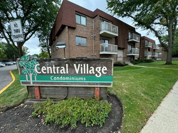 Front view of a multi-story condominium building.