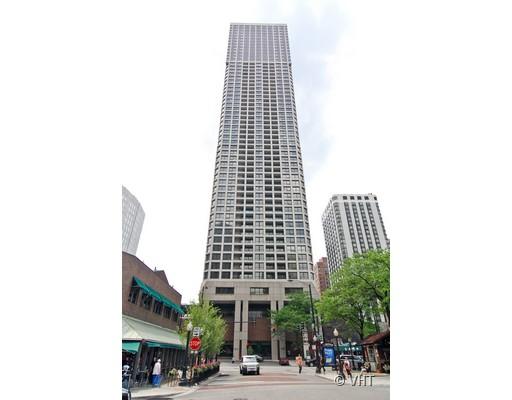 Front view of a tall high-rise building with multiple stories.