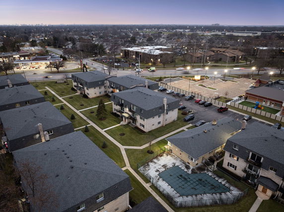 Panoramic view of a residential development with multiple apartment buildings.