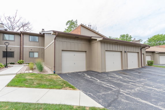 Front view of a building with multiple garages.