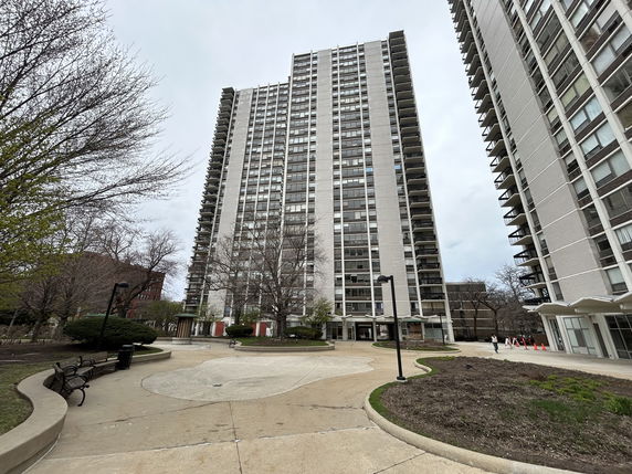 Front view of a tall residential building.
