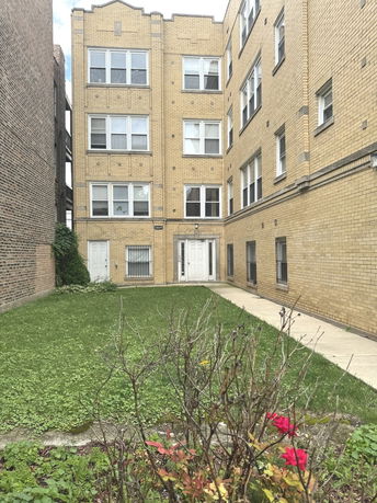 Front view of a multi-story brick building