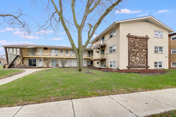 Front view of a multi-story apartment building.