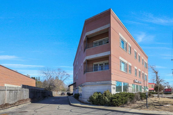 Front view of a three-story brick building.