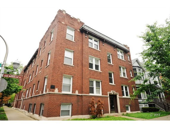 Front view of a multi-story brick building