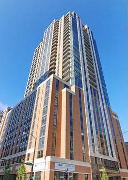 Front view of a high-rise building with multiple floors.