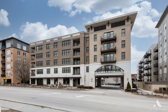 Front view of a multi-story apartment building.