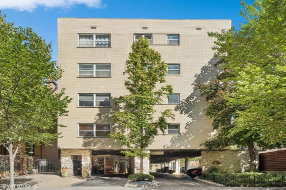 Front view of a multi-story apartment building.