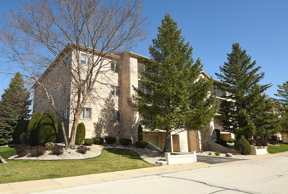 Front view of a multi-story apartment building.
