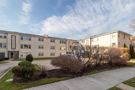 Front view of a multi-story residential apartment building.