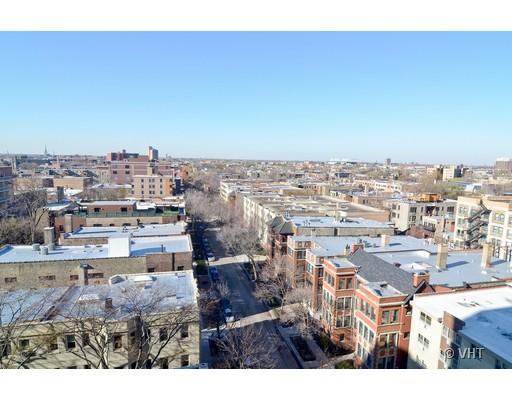 Wide-angle view of urban buildings and streets.