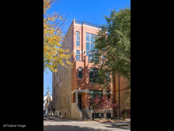 Front view of a multi-story brick building