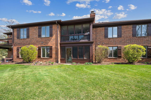 Front view of a two-story brick house.