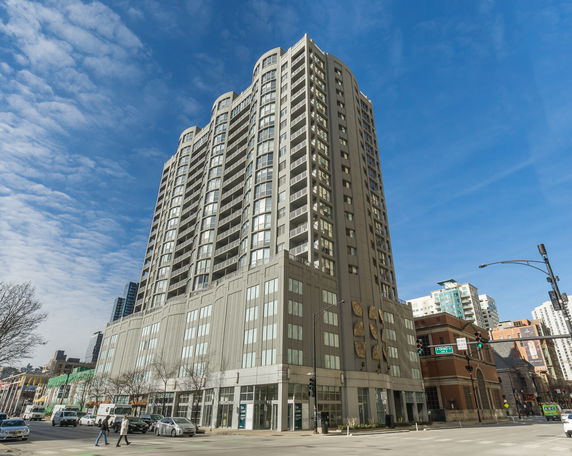 Front view of a multi-story residential building.