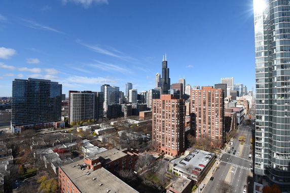 Wide angle view of city buildings and skyline.