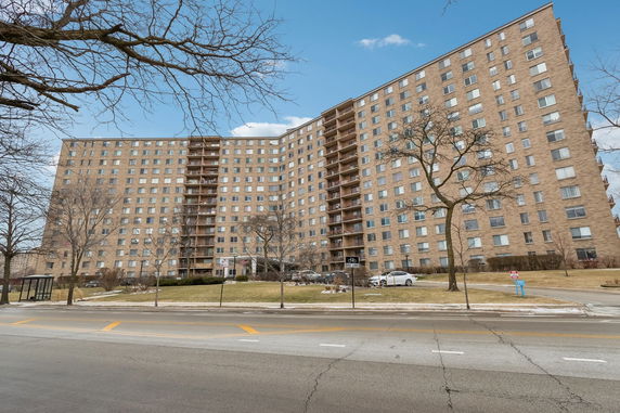 Front view of a multi-story apartment building.