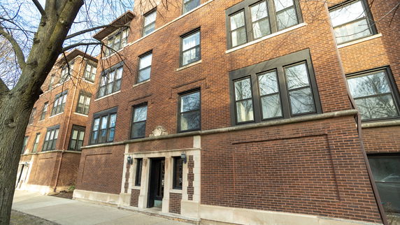 Front view of a multi-story brick building