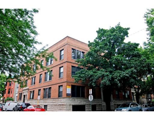 Front view of a multi-story brick building.