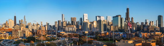 Panoramic view of a city skyline with tall buildings and skyscrapers.