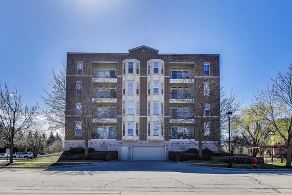 Front view of a multi-story apartment building.