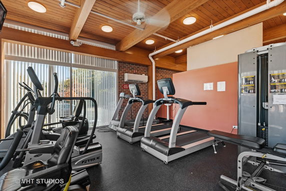 Indoor gym with treadmills and exercise equipment.