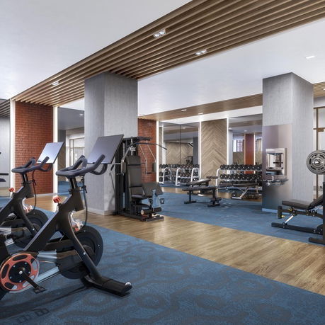 Interior view of a gym with exercise equipment.
