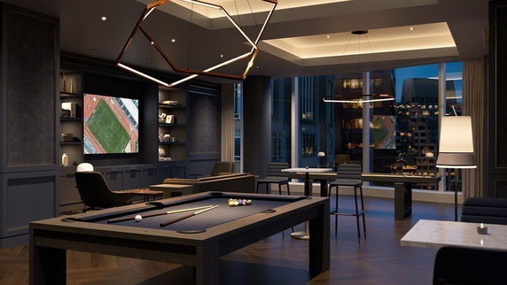 Modern indoor recreation area with a pool table and seating.