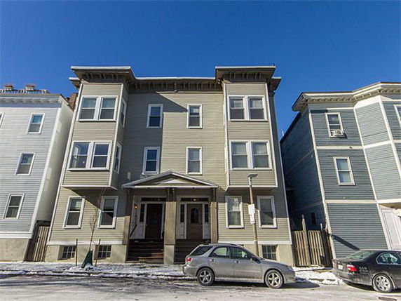 Front view of a multi-story residential building.