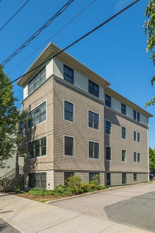 Front view of a multi-story residential building.