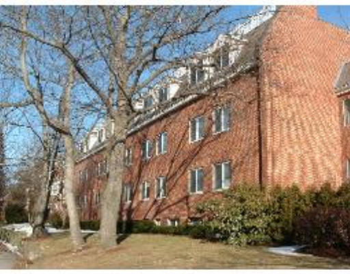 Front view of a multi-story brick building.
